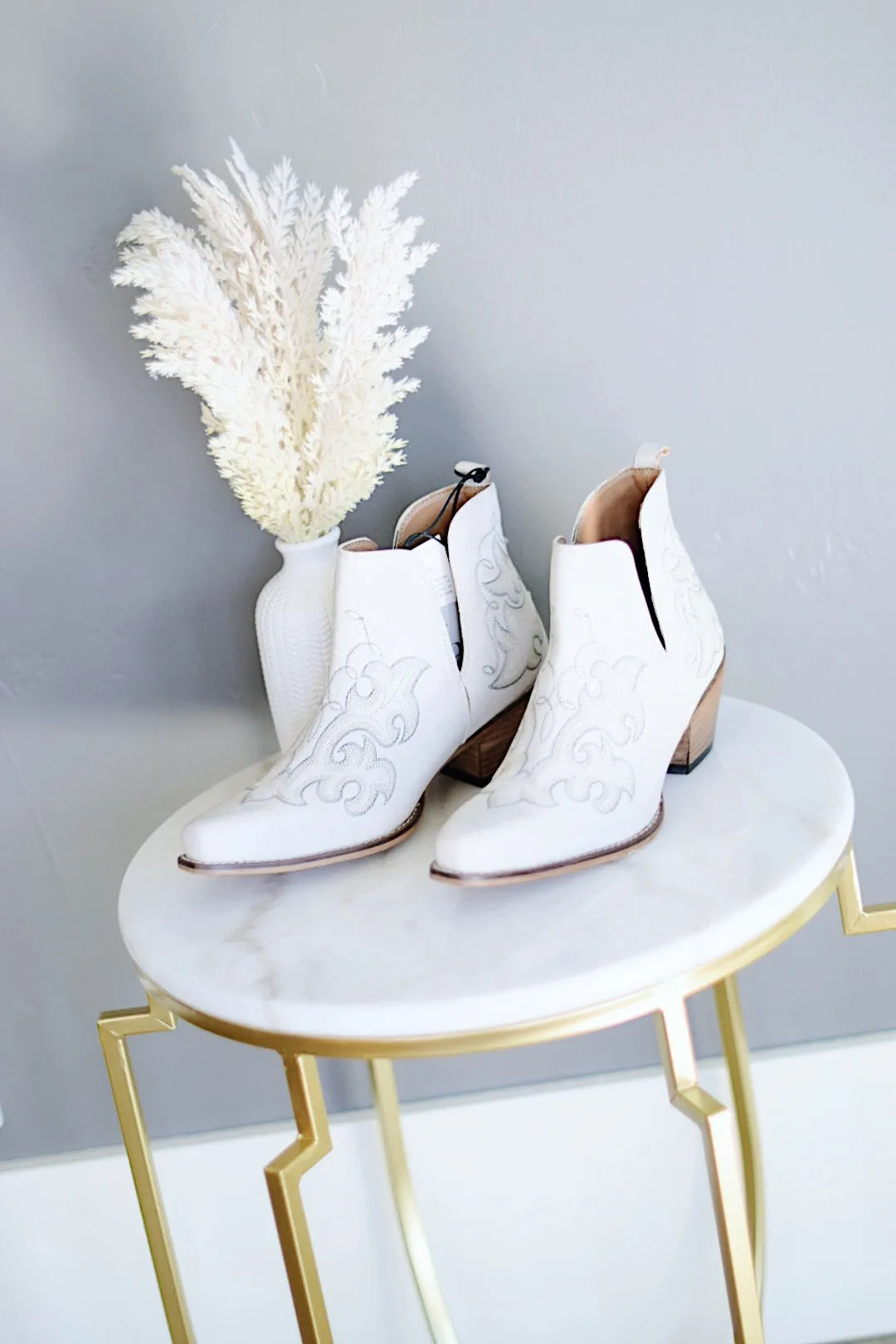 La Ponderosa Booties In Ivory Suede