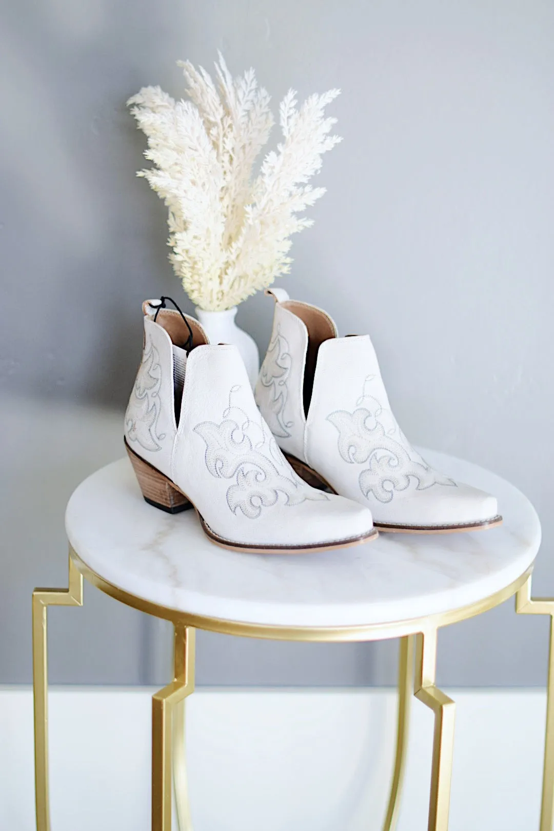 La Ponderosa Booties In Ivory Suede
