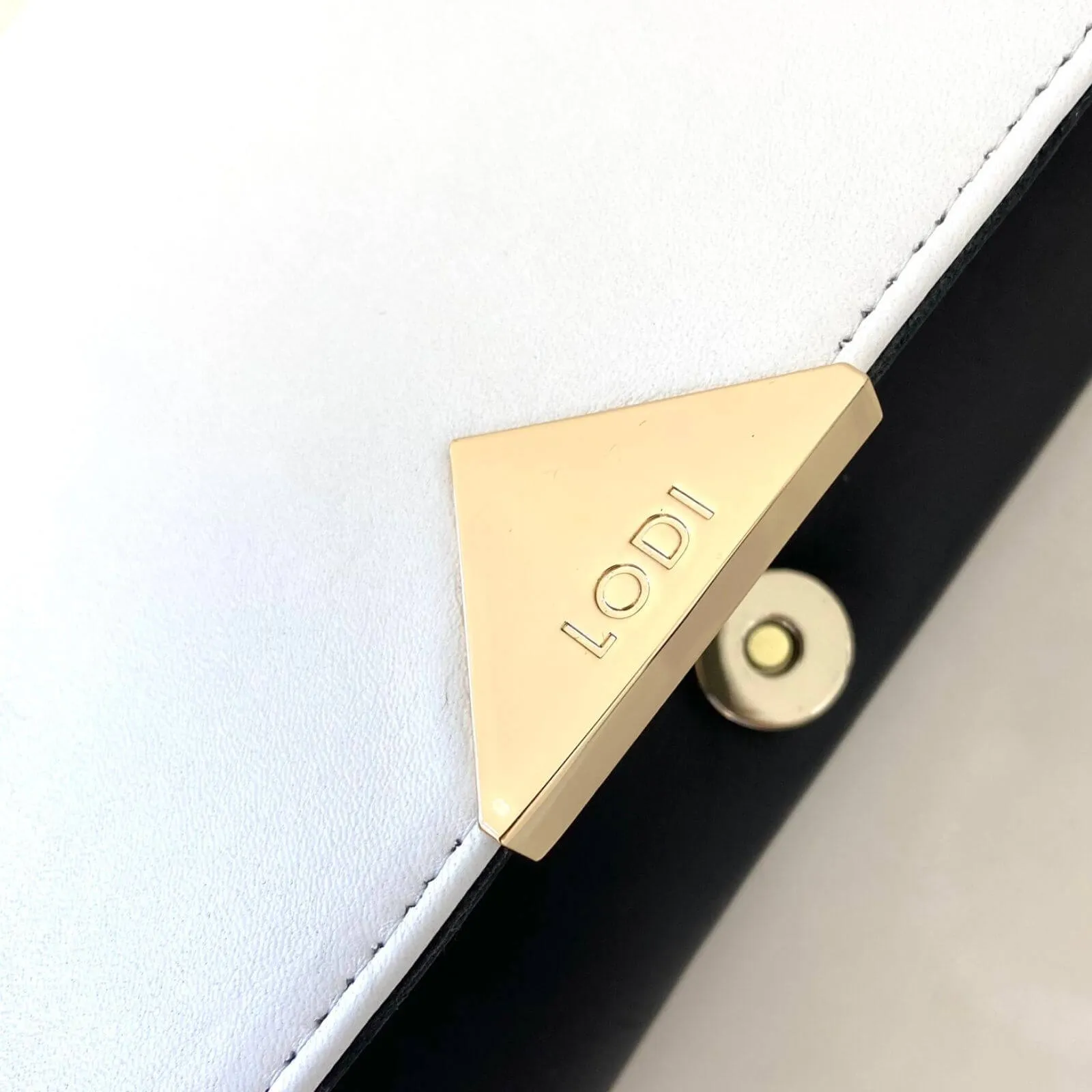 Lodi Black & White Leather Clutch Bag